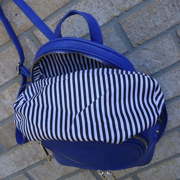 Mini backpack purse with gold tone zippers. main image 10